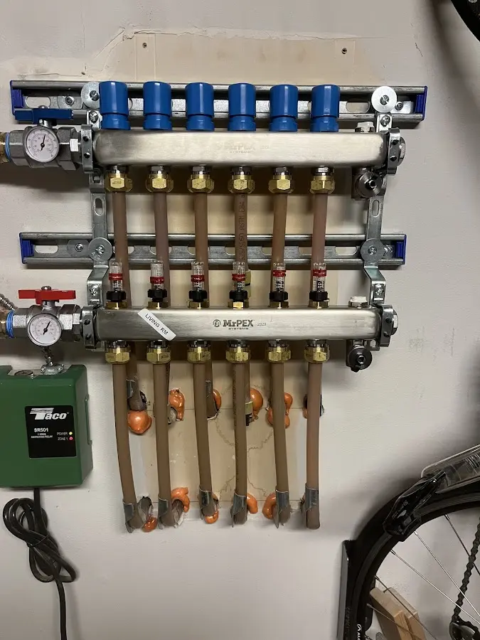 Plumber performing Water Heater Repair at a residential property in Craig